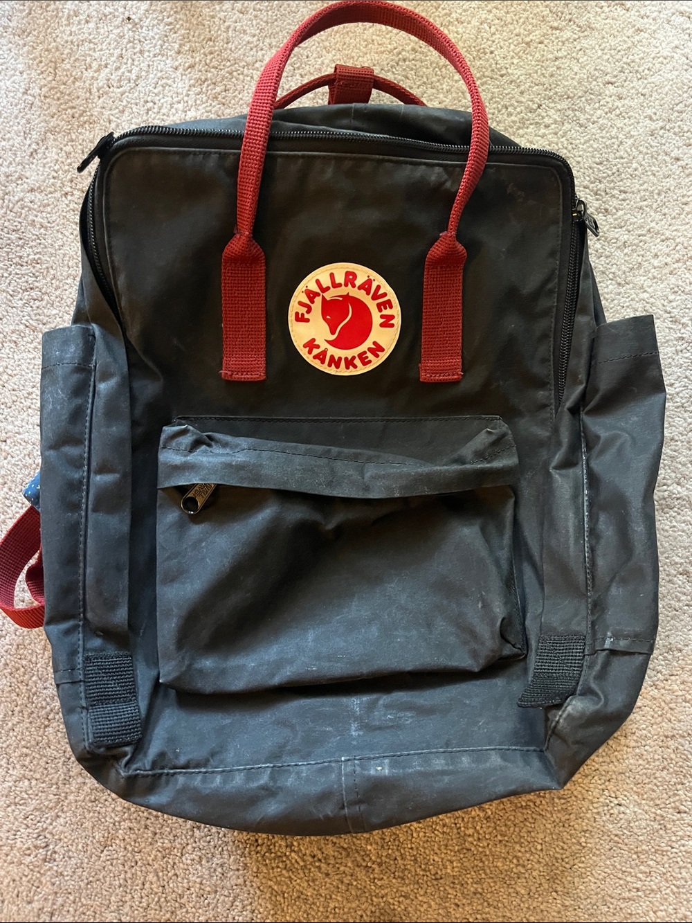 Fjallraven Kanken Backpack in Black with Red Straps with extra strap padding